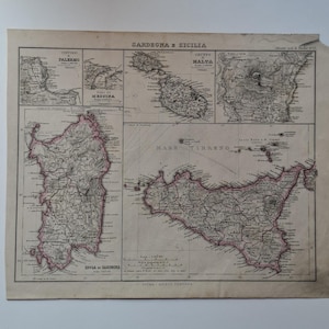May include: An antique paper map titled SARDEGNA E SICILIA featuring detailed cartography of Sardinia and Sicily, with smaller inset maps of Palermo, Messina, Malta, and the Lipari Islands. The map includes geographical labels and scale markers.
