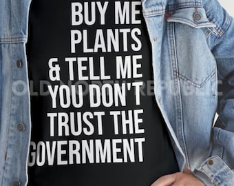 Buy Me Plants & Tell Me You Don't Trust The Government Unisex Heavy Cotton Tee