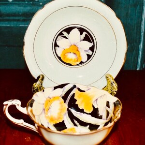 Paragon Double Warant Hand Painted Cup and Saucer with Daffodil pattern
