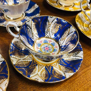 Beautiful Paragon Cadenza Tea Cup and Saucer, deep blue, yellow, turqouise