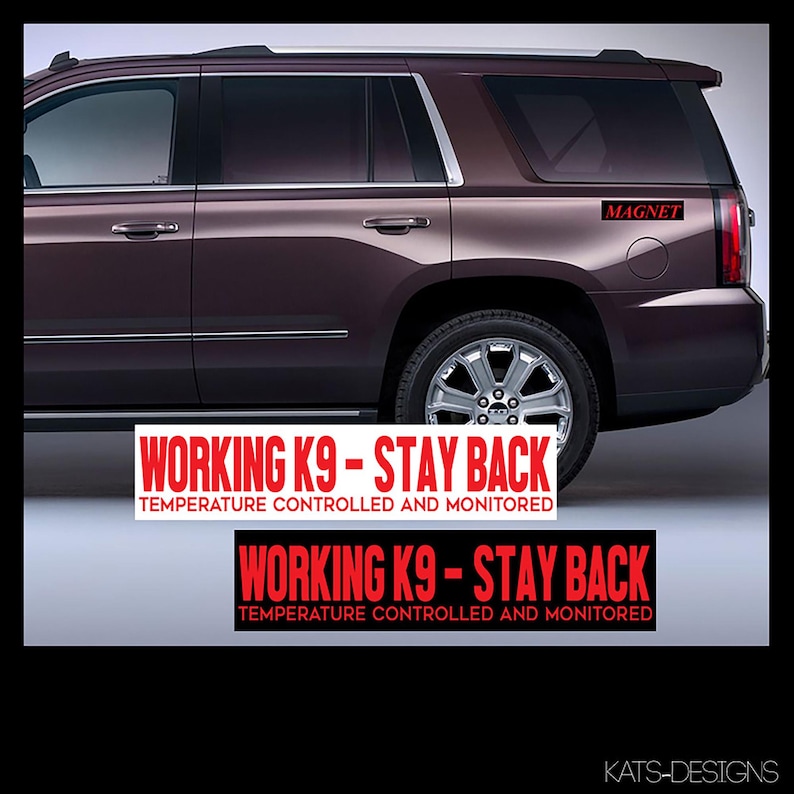 May include: A burgundy SUV with a black and white sticker that reads "WORKING K9 - STAY BACK TEMPERATURE CONTROLLED AND MONITORED" on the rear bumper. The sticker is repeated on the lower bumper. The word "MAGNET" is written in red on the rear window.