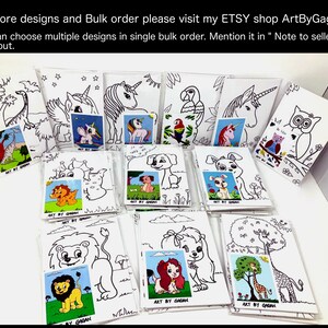 May include: A collection of black and white coloring pages featuring various animal designs, including a giraffe, unicorn, owl, lion, and dog. The pages are printed on white cardstock and are ready to be colored.