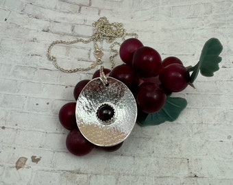 Hand hammered Sterling Silver with Garnet