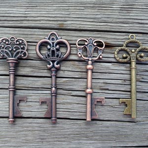 Key Bottle Openers for Wedding Favors. Assorted color and variety of rustic key wedding favors