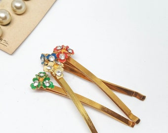 Unused vintage flower hair pins, floral rhinestone bobby pins, gold 70s 80s hair slides.