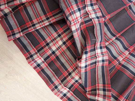 Plaid midi skirt top 7 little words