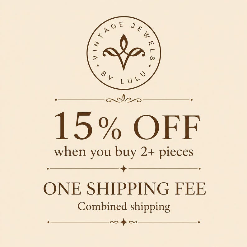 May include: A cream-colored graphic featuring a circular logo at the top with the text VINTAGE JEWELS BY LULU. Below, the text reads 15% OFF when you buy 2+ pieces, followed by ONE SHIPPING FEE and Combined shipping, all in dark brown lettering.