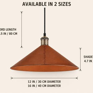May include: A brown leather pendant light with a conical shade and a black cord. Text indicates it is available in two sizes with a 31.5 inch cord length, a 4.7 inch shade height, and diameters of 12 inches or 16 inches for the shade.