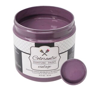 May include: A 473 ml jar of Colorantic vintage paint in a purple shade. The jar has a white label with the brand name and product details. The label reads "Colorantic, Peinture - Paint, vintage, Peinture pour meubles & de decorat, Furniture & Home Decor Paint, 473 ml - 16 oz."