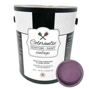 May include: A one-gallon (3.66 L) can of Colorantic vintage chalk paint in a purple shade. The can features a white label with the brand name, product description, and instructions for use. The paint is suitable for furniture and home decor.