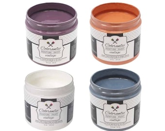 May include: Four jars of Colorantic vintage paint in four different colors: purple, orange, white, and blue. Each jar has a white label with the brand name and the words "PEINTURE-PAINT vintage".