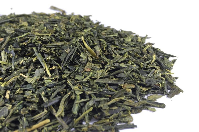 May include: Loose green tea leaves, a popular choice for brewing a refreshing beverage.