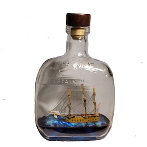 Ship of the Line model in a glass bottle, 8&quot;