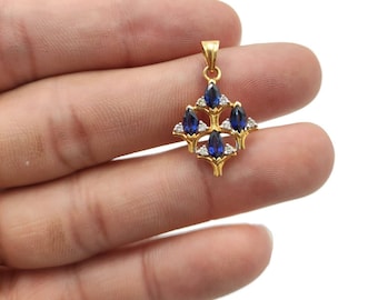 20k Gold Blue Sapphire Pendant with Diamond Accents