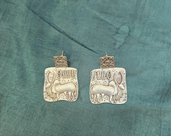 Vintage Afghani Silver Earrings: Handmade Bull Carved Design