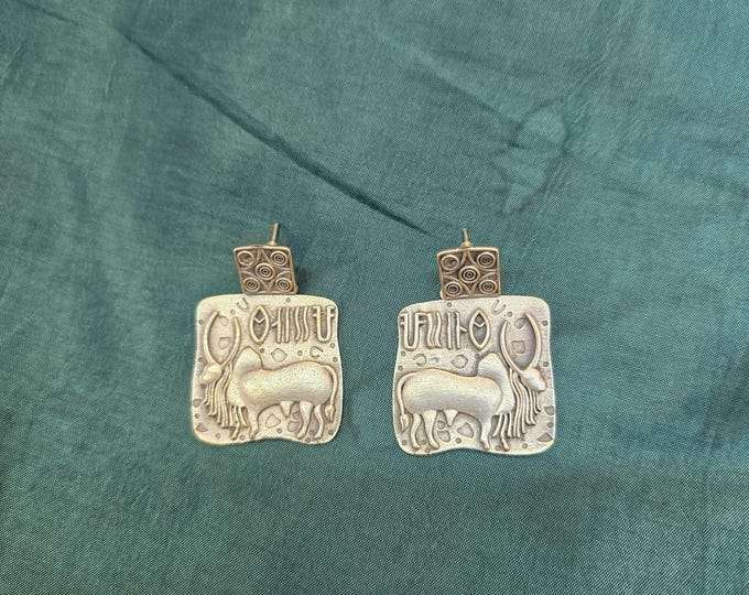Vintage Afghani Silver Earrings: Handmade Bull Carved Design