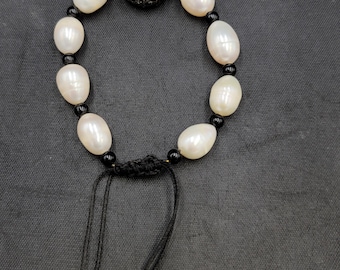 Freshwater Pearl Bracelet with Silver, Ruby, and Emerald Bead - Adjustable