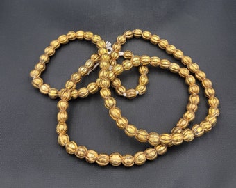 100 Picese Small Beads Antique Gold Over Silver and Wax