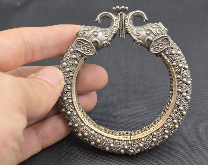 Handmade Tibetan Silver Elephant Bangle: Antique Carved Design