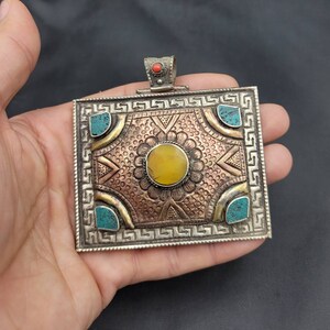 Vintage Tibetan Silver Bronze Pendant: Carved Turquoise & Copal Stone