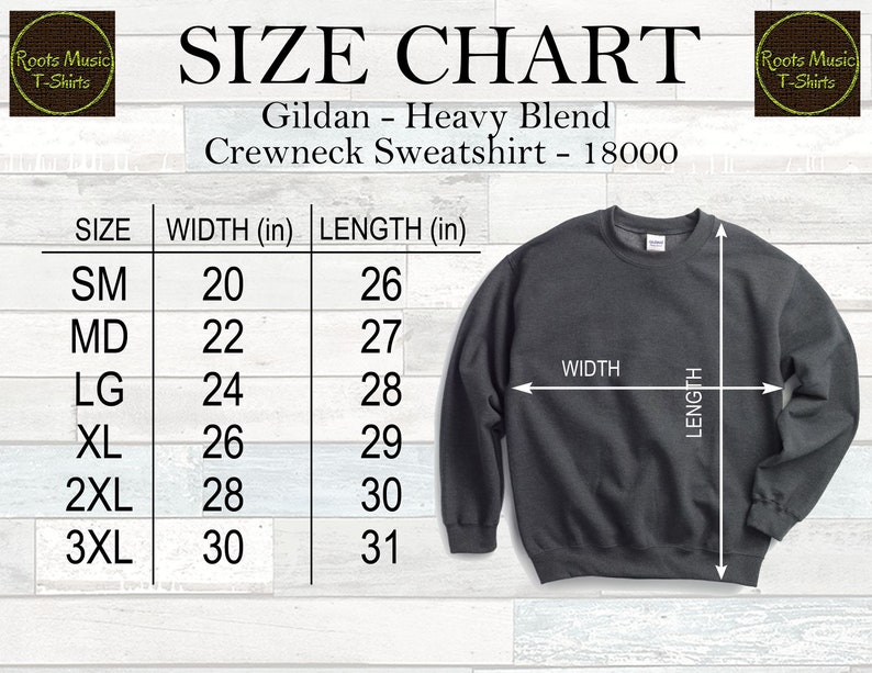 May include: A size chart for a Gildan Heavy Blend Crewneck Sweatshirt, model 18000. The chart shows measurements in inches for sizes SM to 3XL. The sweatshirt is dark grey, with white arrows indicating width and length.