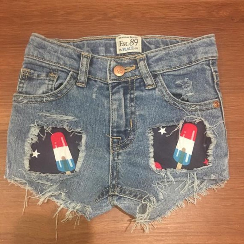 Patriotic distressed shorts Girls distressed denim shorts distressed jeans 4th of July shorts Distressed Bomb Pop Popsicles denim Jeans