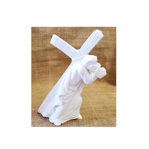 Jesus carrying His cross in bisque.