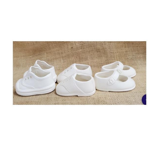 Ceramic baby shoes used for  adding Birth Date, weight etc for that new one.