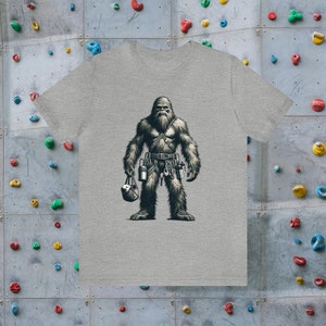 Sasquatch Rock Climber | Big Foot Rock Climbing Hairy Beast Unisex Jersey Short Sleeve Tee