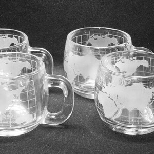 4 Nestle World Cup Clear Crystal Cups / Mugs With World Map Design image 1