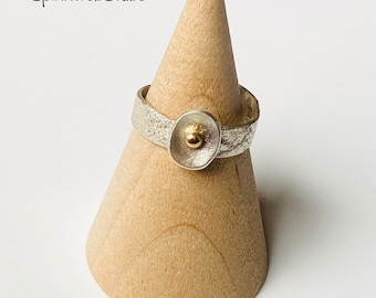 Melted silver ring “With rose gold”