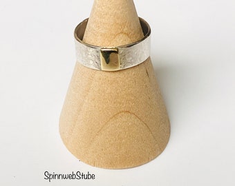 Silver band ring "with gold"