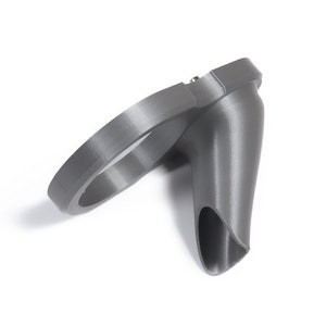 May include: A gray 3D printed plastic funnel with a circular base and a long, narrow spout.