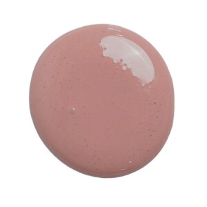 May include: A close-up of a pink and white circle of nail polish. The polish has a glossy finish and a subtle shimmer.
