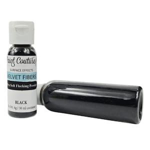 May include: A clear plastic bottle filled with black flocking powder, featuring a white cap and a label that reads Paint Couture! Surface Effects Velvet Fibers Ultra Soft Flocking Powder Black Net Wt. 6g / 30 ml container.