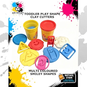 May include: A set of toddler play shape clay cutters featuring various plastic moulds in yellow, red, blue, and pink. The set includes two yellow containers with lids, several smiley face shaped cutouts, and moulded clay pieces in blue and white.
