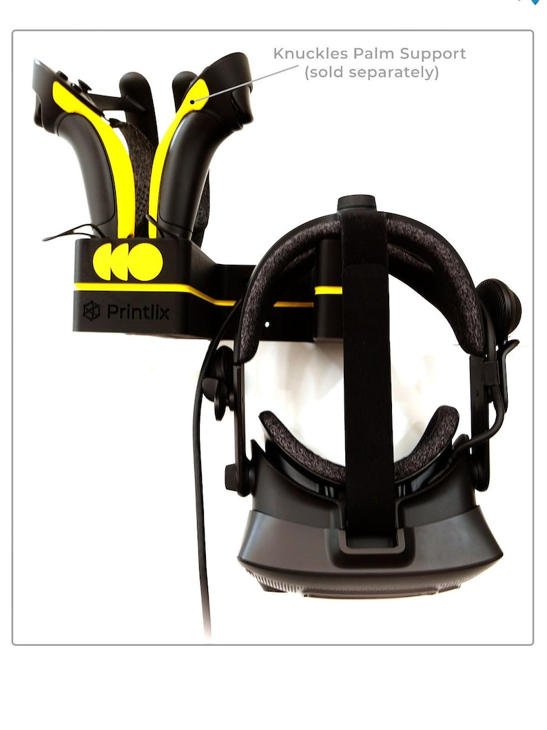 May include: A black VR headset with yellow accents is mounted on a wall-mounted stand. The headset is designed to hold the controllers, which are also black with yellow accents. The stand is labelled "Printlix".