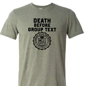 May include: A green t-shirt with the text "Death Before Group Text" and a black and white logo for Stanhope State University, College of Communication.