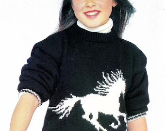 May include: A black knitted sweater with a white horse design. The sweater has a crew neck and long sleeves.