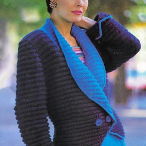 May include: A PDF knitting pattern for a blue and black cardigan with a contrasting blue collar. The cardigan has a button closure and is shown being worn by a model.