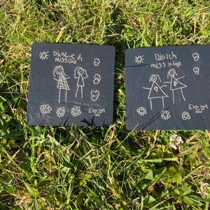 Childrens drawings on a coaster