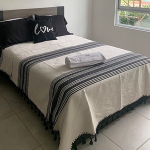 Handmade Mexican Bedspread/Quilt. Sizes: Single 5&#39; x 8&#39; 5&quot;, Full 6&#39; 5&quot; x 8&#39; 5&quot;, Queen 8&#39; x 9&#39; 2&quot; King 9&#39; 9&quot; x 9&#39; 9&quot;. Made of Cotton.
