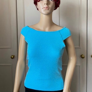 Knitted top in small to medium size