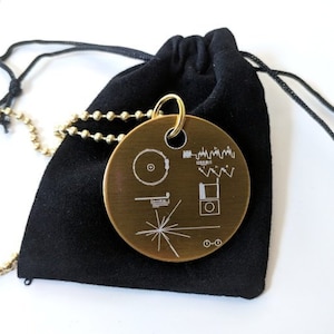 Voyager Golden Record pendant - necklace - laser engraved, in a black velvet drawstring pouch. Includes 80cm ball chain. Can be customised!