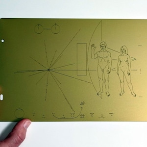 Full size metal replica of NASA Pioneer Plaque, laser engraved and laser cut from golden aluminum. Two colour options to choose from!