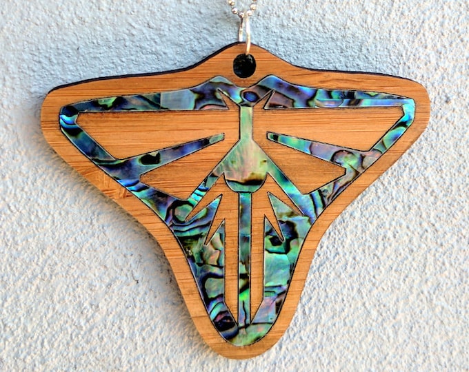 TLOU Fireflies pendant, bamboo inlaid with Paua abalone shell, laser cut. The Last of Us Firefly symbol