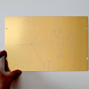 Full size metal replica of NASA Pioneer Plaque, laser engraved and laser cut from golden aluminum. Two colour options to choose from Anodised aluminium