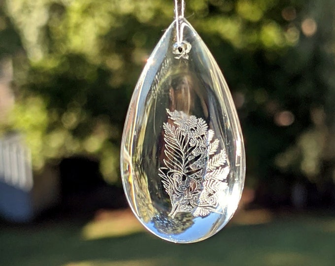 TLOU Ellie's Tattoo crystal pendant, laser etched teardrop pendant. Christmas tree ornament, suncatcher, pendant or car mirror ornament.