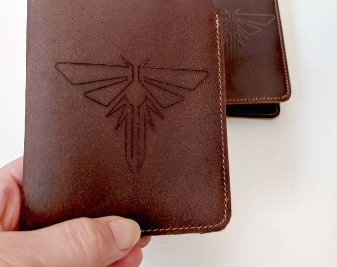 Genuine leather rawhide wallet, laser engraved with The Last of Us Fireflies symbol. Can be custom engraved!