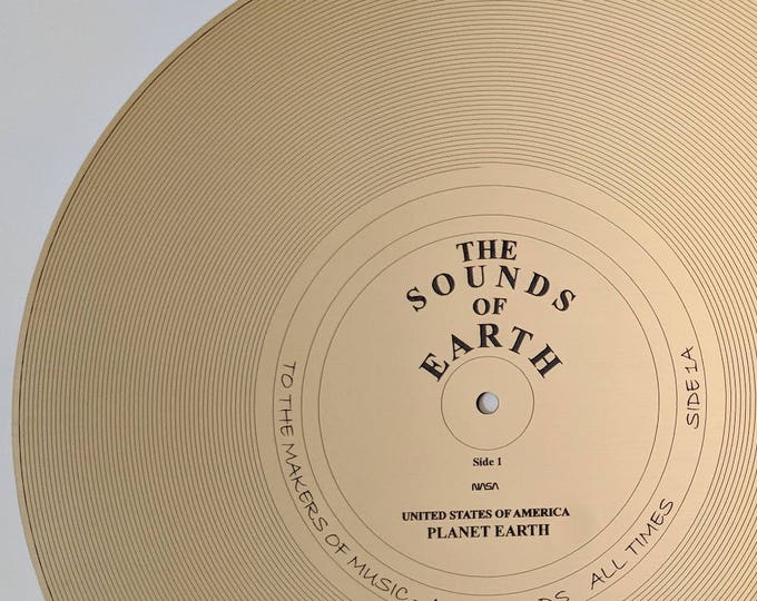 The Sounds of Earth - Full size replica of NASA Voyager Golden Record "Side 1A" - laser engraved on metal or golden metallic laminate.